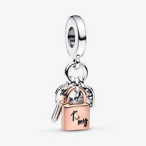 Two-tone Key, Padlock & Heart Triple Dangle Charm offers at S$ 99 in Pandora