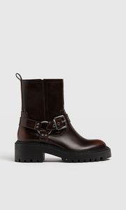 Flat biker ankle boots with buckle details offers at S$ 49.99 in Stradivarius
