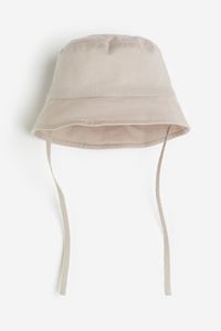 Cotton sun hat offers at S$ 8.95 in H&M