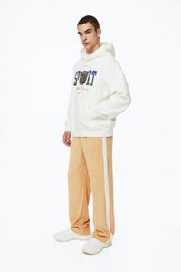 Relaxed Fit Terry track pants offers at S$ 49.95 in H&M