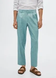 Pleated linen trousers offers at S$ 29.9 in HE by Mango