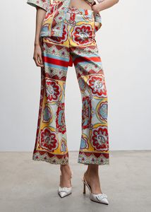 Baroque print trousers offers at S$ 45.9 in Mango