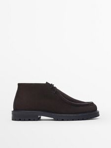 Waxed Leather Ankle Boots offers at S$ 225 in Massimo Dutti