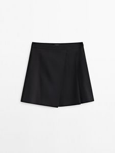Mini Skirt With Box Pleats offers at S$ 179 in Massimo Dutti