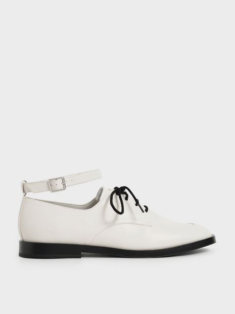 Ankle Strap Derby Shoes offers at S$ 46 in Charles & Keith