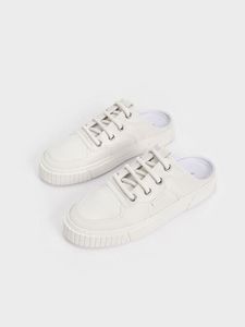 Panelled Slip-On Sneakers               - white offers at S$ 46.1 in Charles & Keith