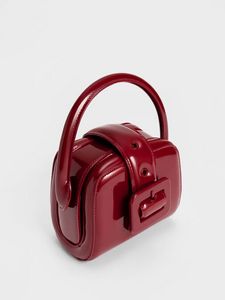 Lula Patent Belted Bag               - red offers at S$ 39.9 in Charles & Keith