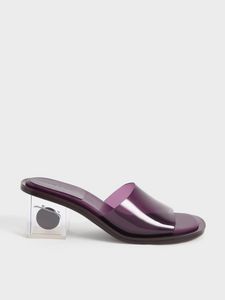 Madison Clear Sculptural Heel Mules offers at S$ 1050 in Charles & Keith
