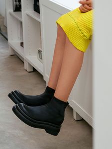 Nola Slip-On Ankle Boots​ offers at S$ 66 in Charles & Keith