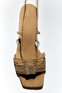 LACE UP LEATHER LOW-HEEL SANDALS offers at S$ 69.9 in ZARA