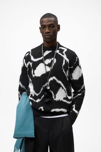 ABSTRACT JACQUARD SWEATER offers at S$ 53.9 in ZARA