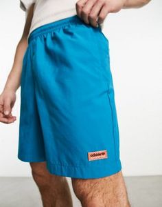Adidas Origianls Adventure logo woven shorts in blue offers at S$ 20 in asos