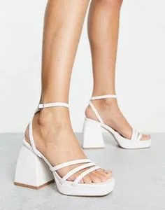 Schuh Swae platform heeled sandals in white offers at S$ 17.5 in asos
